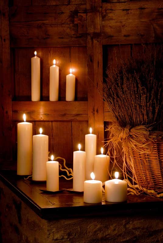 Velón cilíndrico de 20 x 4 cm.